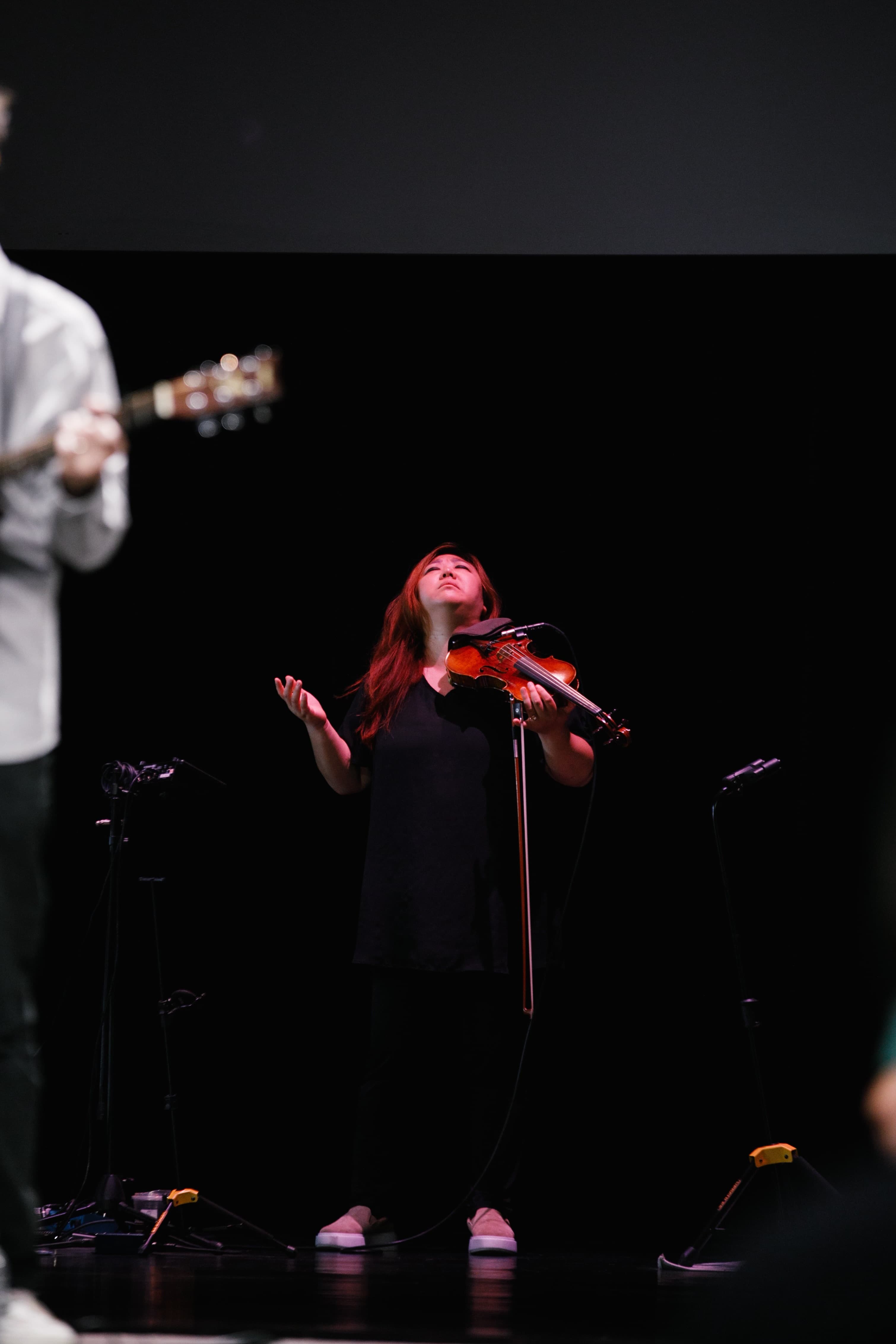 Fay You performing on stage with her violin